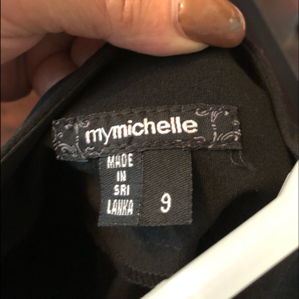 Cute black skirt  16” across and 23 long